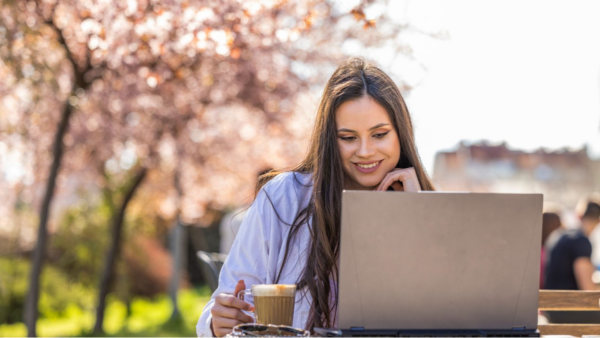 Marketer reading Dotdigital’s social media calendar for May 2025.
