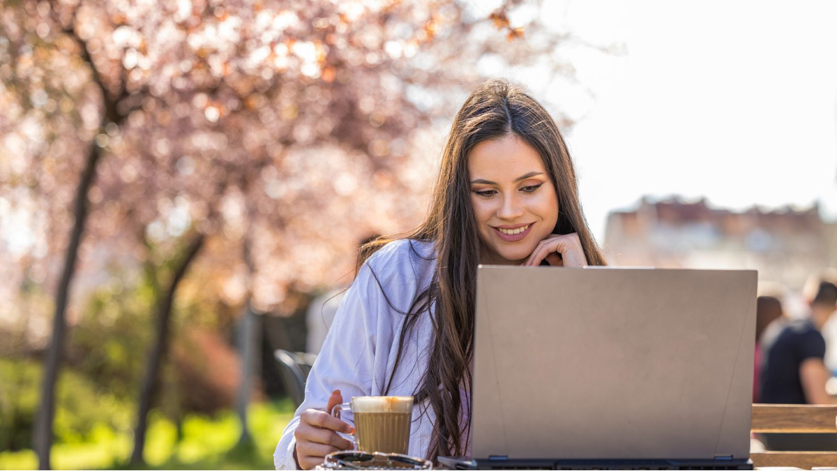 Marketer reading Dotdigital’s social media calendar for May 2025.